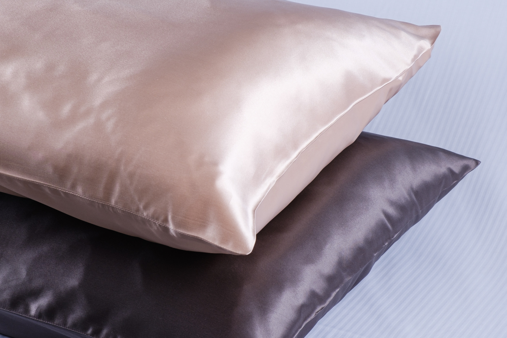 How to Wash Silk Pillowcases silk pillows for sleeping on a blank background