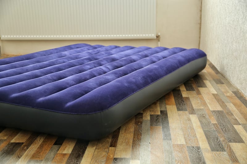 How to Fix a Hole in an Air Mattress Stock image of an air mattress