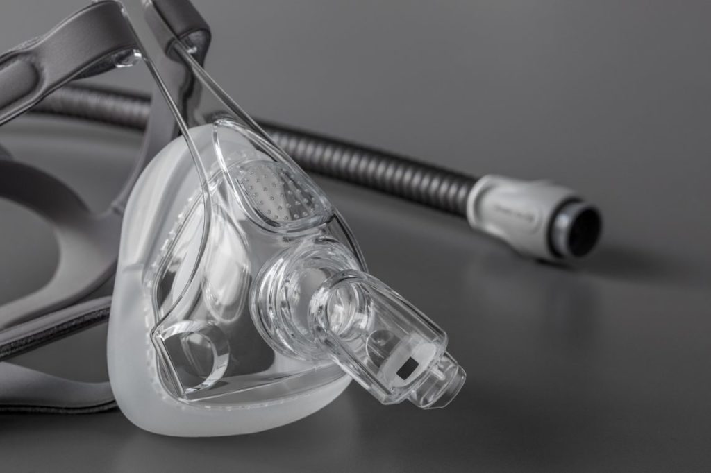 What Does CPAP Stand For? And Other PAP Acronyms stock photo of a cpap mask