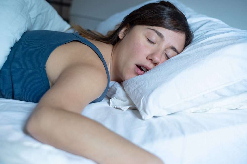 What Are Micro CPAP Devices and Do They Work? woman snoring in bed